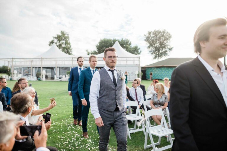 A professional wedding videographer or a friend with a familiar camera. Why choose a professional?